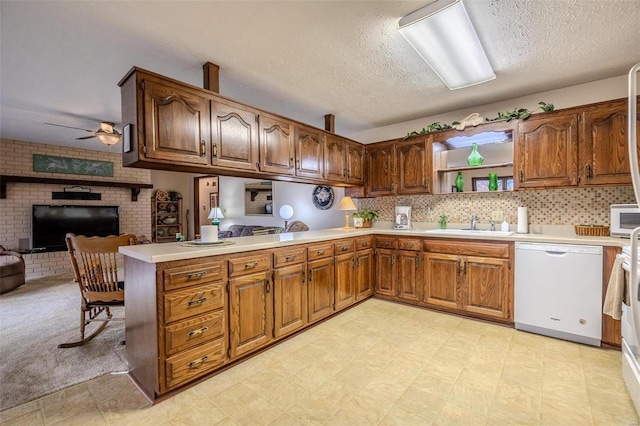 kitchen featuring white appliances, open shelves, a ceiling fan, a textured ceiling, and light countertops