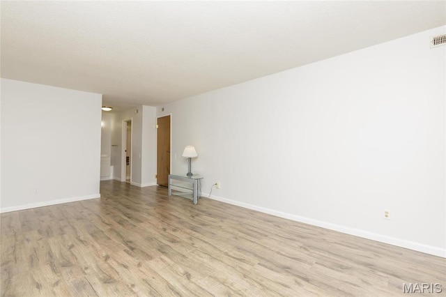 585 Coeur De Royale Dr Unit 201, Saint Louis, MO 63141 - empty room with light wood finished floors and baseboards