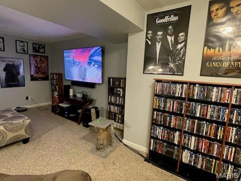 carpeted cinema with baseboards