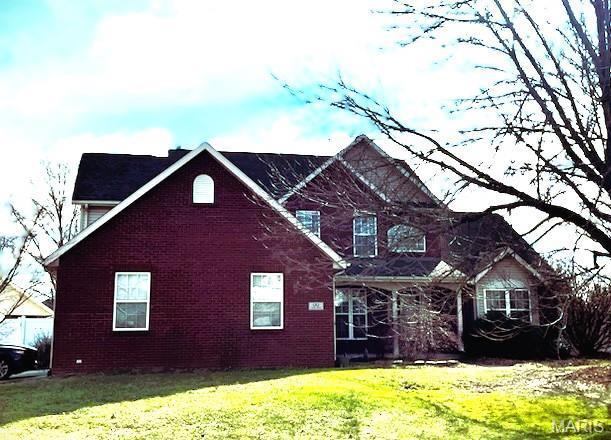 1212 Usher Dr, Ofallon, IL 62269 - rear view of property featuring a yard and brick siding