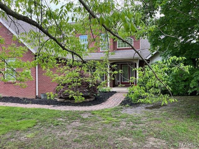 1212 Usher Dr, Ofallon, IL 62269 - rear view of property with brick siding