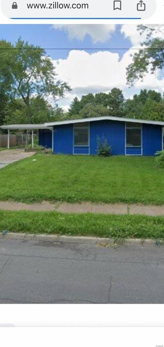 805 Derhake Rd, Florissant, MO 63033 - view of side of property with a lawn