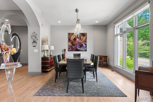 2535 S Lindbergh Blvd, Saint Louis, MO 63131 - dining area featuring plenty of natural light, light wood-type flooring, arched walkways, and recessed lighting