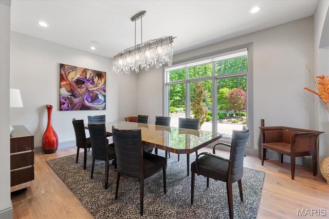 2535 S Lindbergh Blvd, Saint Louis, MO 63131 - dining space featuring light wood-type flooring, recessed lighting, and a chandelier