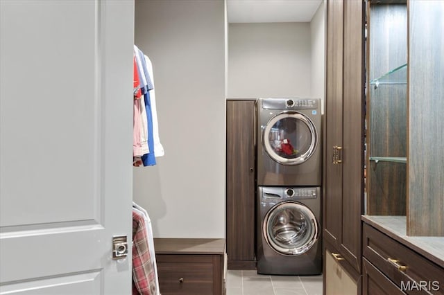 2535 S Lindbergh Blvd, Saint Louis, MO 63131 - laundry area with stacked washer / drying machine and light tile patterned floors