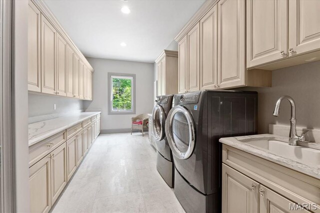 2535 S Lindbergh Blvd, Saint Louis, MO 63131 - laundry area featuring washing machine and clothes dryer, cabinet space, recessed lighting, and baseboards