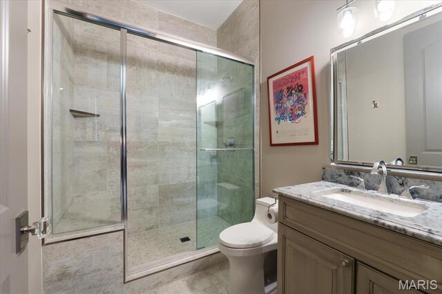 2535 S Lindbergh Blvd, Saint Louis, MO 63131 - bathroom featuring toilet, vanity, and a stall shower