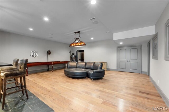 2535 S Lindbergh Blvd, Saint Louis, MO 63131 - living area with wood finished floors, recessed lighting, and baseboards