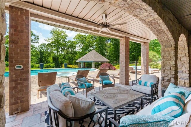 2535 S Lindbergh Blvd, Saint Louis, MO 63131 - view of patio / terrace with an outdoor hangout area, a gazebo, ceiling fan, and a pool with connected hot tub
