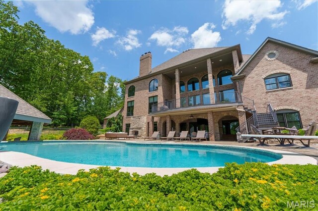 2535 S Lindbergh Blvd, Saint Louis, MO 63131 - swimming pool featuring a patio area and stairway