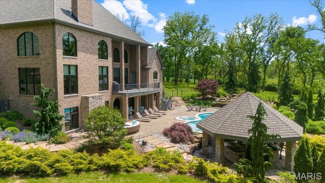2535 S Lindbergh Blvd, Saint Louis, MO 63131 - view of swimming pool featuring a patio