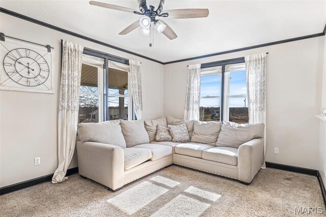 215 Virginia St, Saint Genevieve, MO 63670 - living room with ceiling fan, light carpet, and ornamental molding