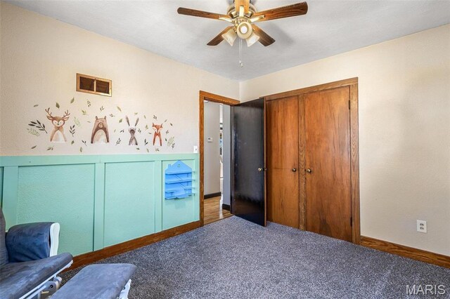 215 Virginia St, Saint Genevieve, MO 63670 - carpeted bedroom with a closet and a ceiling fan