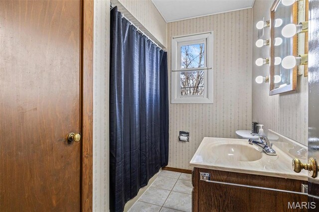 215 Virginia St, Saint Genevieve, MO 63670 - full bathroom featuring wallpapered walls, vanity, tile patterned floors, and curtained shower
