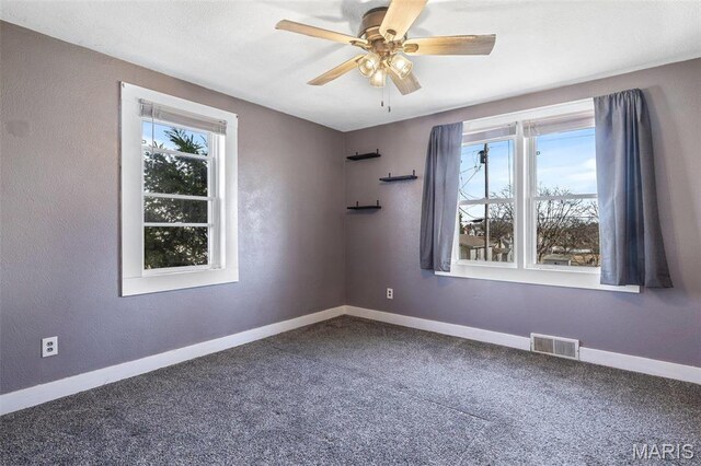 215 Virginia St, Saint Genevieve, MO 63670 - spare room with carpet floors and a ceiling fan