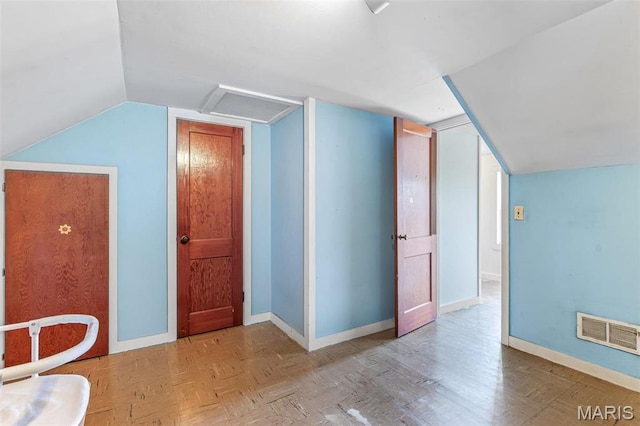 215 Virginia St, Saint Genevieve, MO 63670 - bonus room featuring lofted ceiling and baseboards