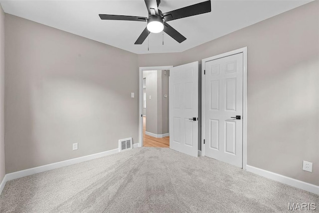 1247 Charlane Ct, Saint Louis, MO 63119 - unfurnished bedroom featuring light carpet and ceiling fan