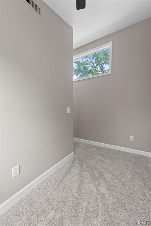 1247 Charlane Ct, Saint Louis, MO 63119 - spare room with carpet flooring and a ceiling fan
