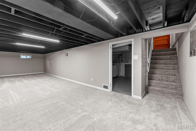 1247 Charlane Ct, Saint Louis, MO 63119 - below grade area with carpet and stairway