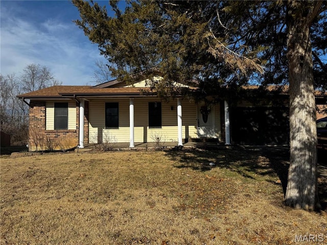 1603 Belleau Lake Dr, Ofallon, MO 63366 - ranch-style home with a front lawn, covered porch, and brick siding