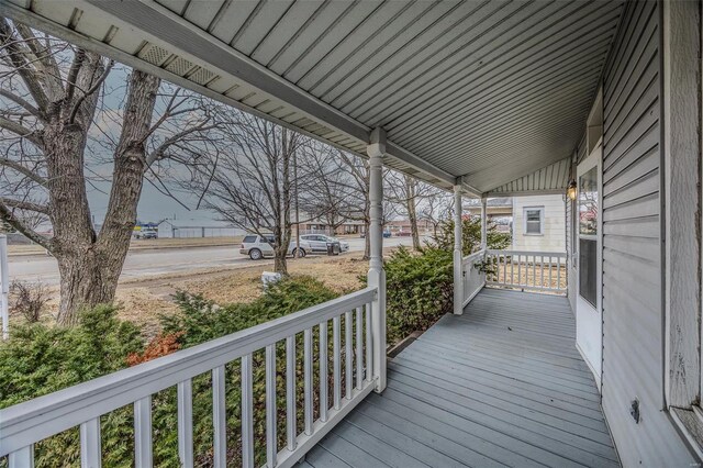 342 N Adams Ave, Lebanon, MO 65536 - wooden deck with covered porch