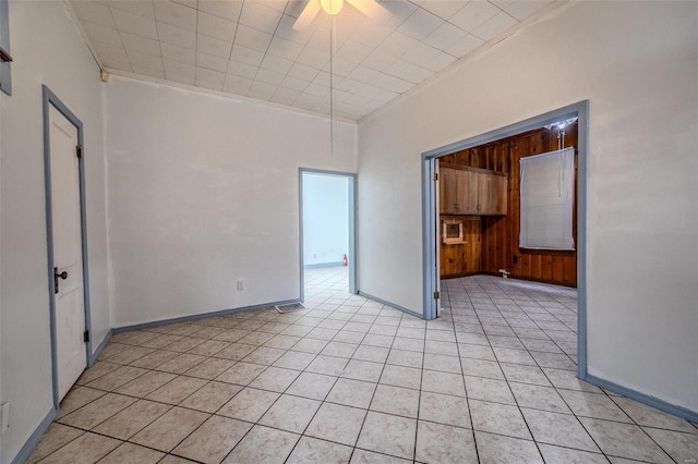342 N Adams Ave, Lebanon, MO 65536 - spare room featuring a ceiling fan, light tile patterned floors, and baseboards