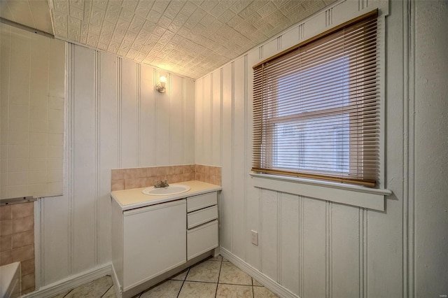 342 N Adams Ave, Lebanon, MO 65536 - bathroom with vanity and tile patterned floors