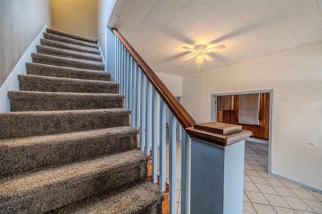 342 N Adams Ave, Lebanon, MO 65536 - staircase with tile patterned flooring, a ceiling fan, and baseboards