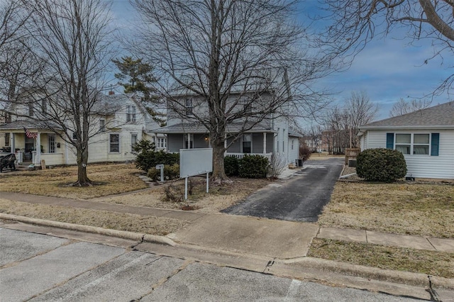 342 N Adams Ave, Lebanon, MO 65536 - view of front facade featuring a porch, driveway, and a residential view
