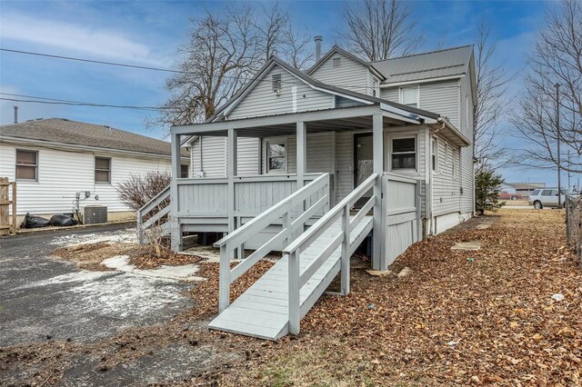 342 N Adams Ave, Lebanon, MO 65536 - view of front of house with a porch and central air condition unit