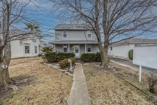 342 N Adams Ave, Lebanon, MO 65536 - traditional-style house with covered porch and central air condition unit