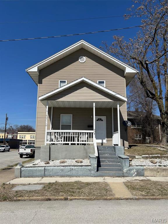 618 Church St, Hannibal, MO 63401 - view of front facade featuring covered porch