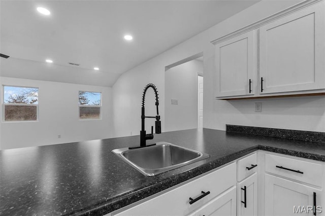 18211 State Highway J, Malden, MO 63863 - kitchen with a sink, white cabinetry, recessed lighting, and dark countertops