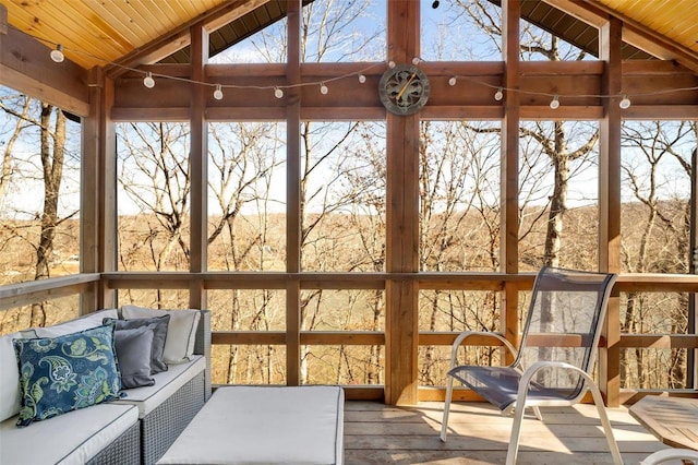 12054 Anthonies Mill Rd, Bourbon, MO 65441 - sunroom with lofted ceiling and an outdoor hangout area