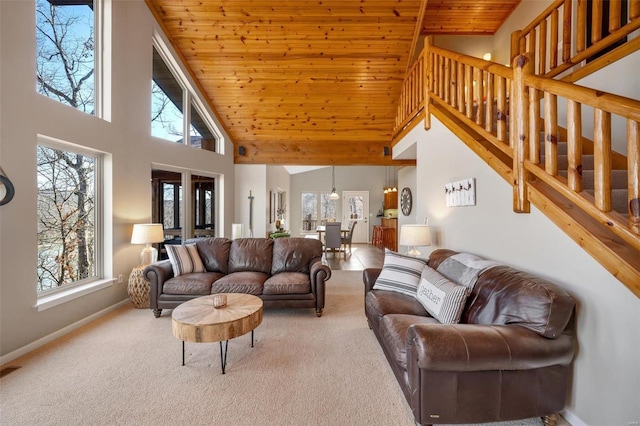 12054 Anthonies Mill Rd, Bourbon, MO 65441 - carpeted living area featuring wooden ceiling, high vaulted ceiling, baseboards, and stairs