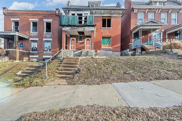 5943 Page Blvd, Saint Louis, MO 63112 - view of front of property with brick siding and stairway