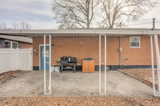 2571 Boyle Ave, Granite City, IL 62040 - rear view of house with fence and brick siding