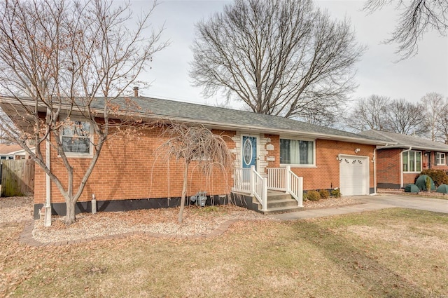 2571 Boyle Ave, Granite City, IL 62040 - ranch-style house featuring a garage, brick siding, driveway, and a shingled roof