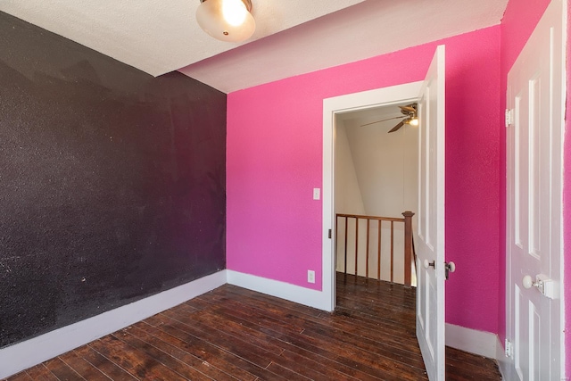 204 S Railroad St, Medora, IL 62063 - empty room with hardwood / wood-style floors, baseboards, and ceiling fan