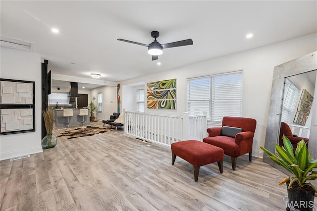 2808 Chadwick Dr, Bel-Nor, MO 63121 - sitting room with light wood-style floors, a ceiling fan, recessed lighting, and baseboards