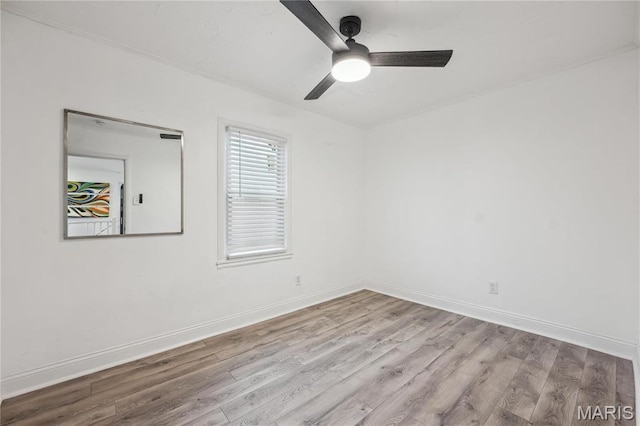 2808 Chadwick Dr, Bel-Nor, MO 63121 - unfurnished room featuring wood finished floors, ceiling fan, and baseboards