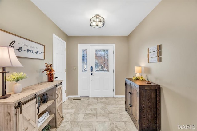1972 Sugar Hollow Ct, Marthasville, MO 63357 - entryway with light marble finish flooring and baseboards