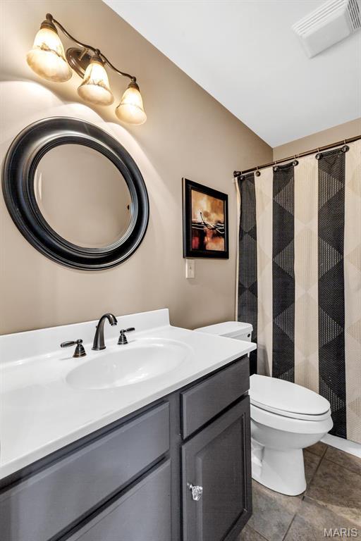 1972 Sugar Hollow Ct, Marthasville, MO 63357 - bathroom featuring vanity and a shower with curtain