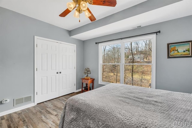 1972 Sugar Hollow Ct, Marthasville, MO 63357 - bedroom featuring wood finished floors, a closet, and a ceiling fan