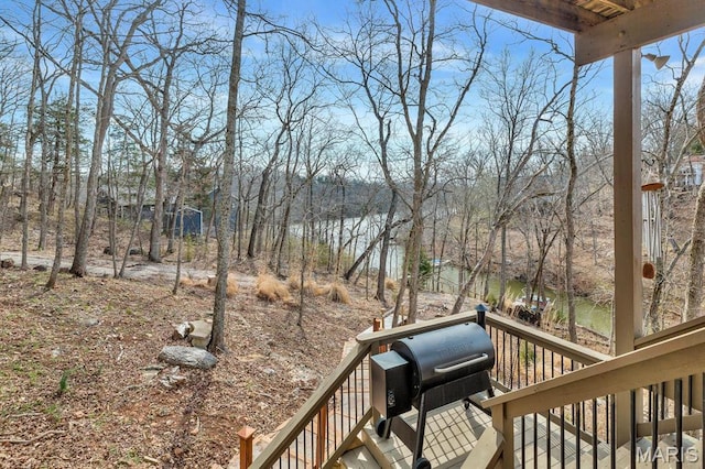 1972 Sugar Hollow Ct, Marthasville, MO 63357 - wooden deck with stairway and view of wooded area