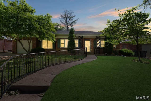 5840 Jamieson Ave, Saint Louis, MO 63109 - view of front facade featuring brick siding and a garage