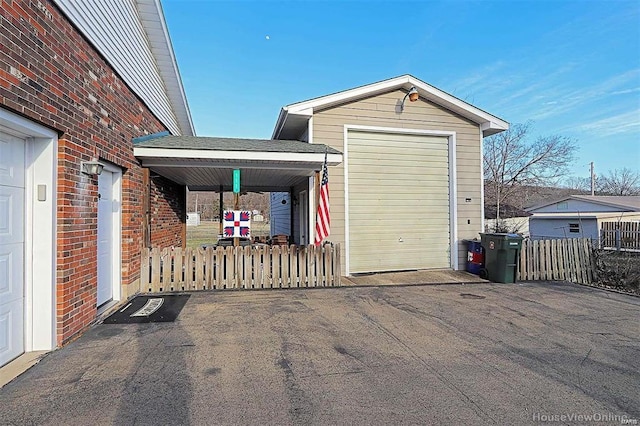 111 S Ziegler St, Pilot Knob, MO 63663 - garage with fence