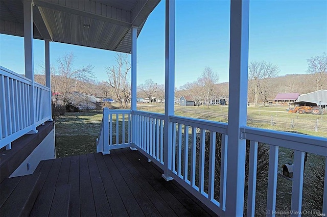 111 S Ziegler St, Pilot Knob, MO 63663 - deck featuring a porch