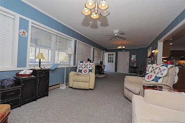 111 S Ziegler St, Pilot Knob, MO 63663 - carpeted living area with crown molding, a chandelier, a ceiling fan, and baseboard heating