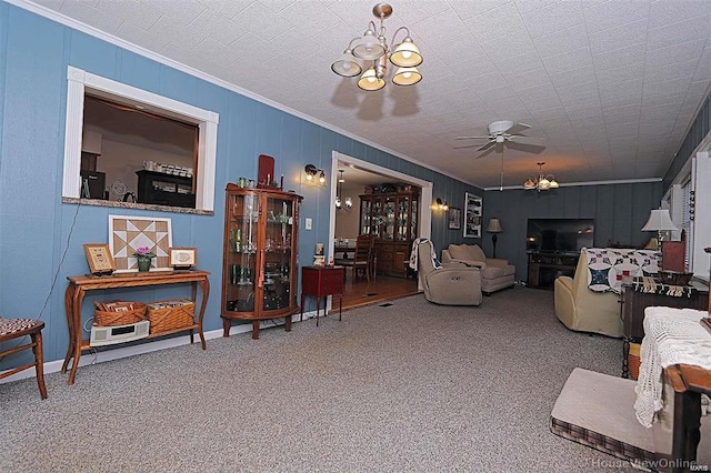 111 S Ziegler St, Pilot Knob, MO 63663 - living area with ornamental molding, a chandelier, ceiling fan, carpet, and baseboards